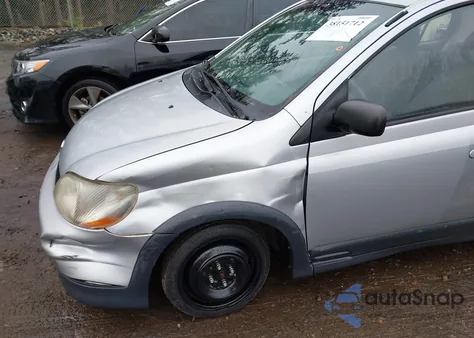 2001 Toyota Echo from USA, damaged, VIN JTDBT123110171709